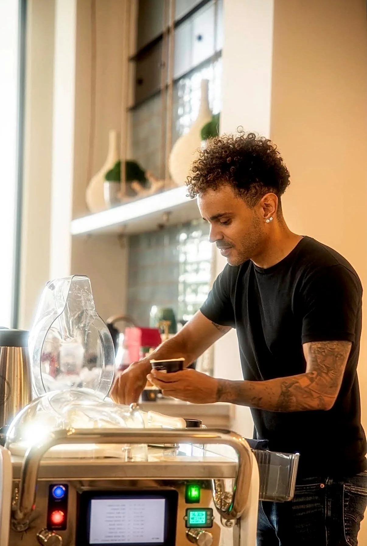 Sam at the coffee station of The Affogato Cart, mid-service