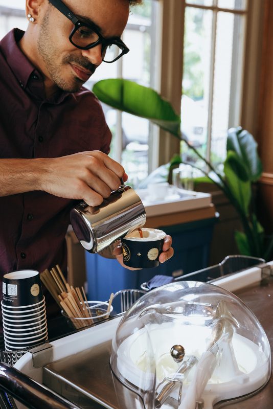Sam pouring a Love Affogato at a wedding